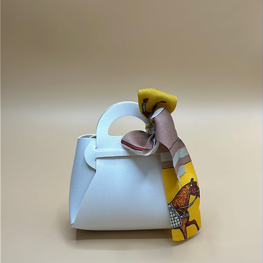 Bomboniera - borsetta avorio con fiocco in tessuto | rohome