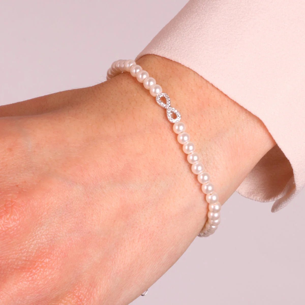 Bracciale in argento con perle di acqua dolce ed infinito | Rohome - Rohome