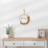 Decorazione murale in metallo con fiore e scritta Family | rohome